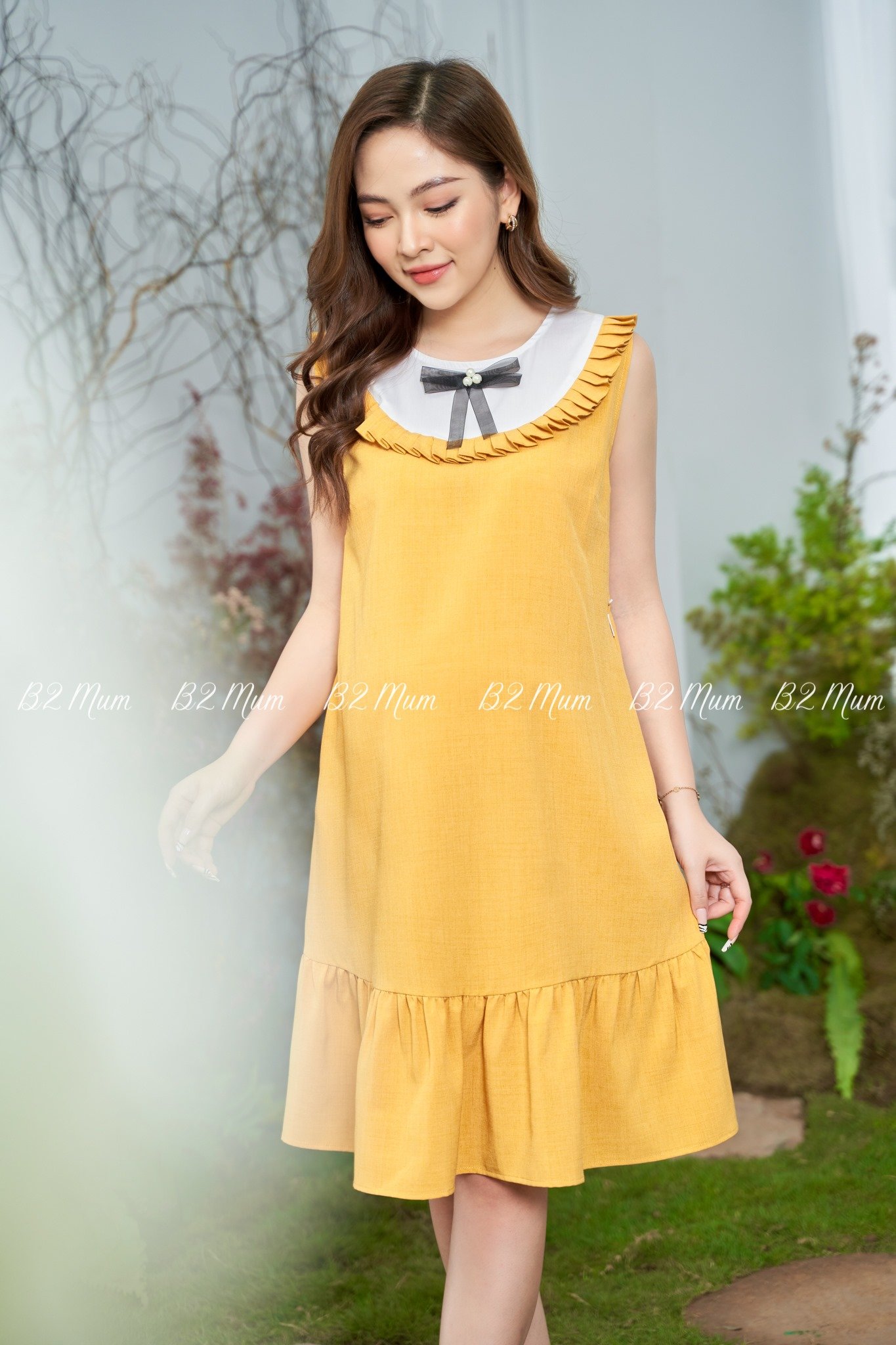 YQN-VBN330 Váy đuôi cá vàng ko tay cổ nơ đen B2M-duoc-ban-tai-Chuẩn Mom’s