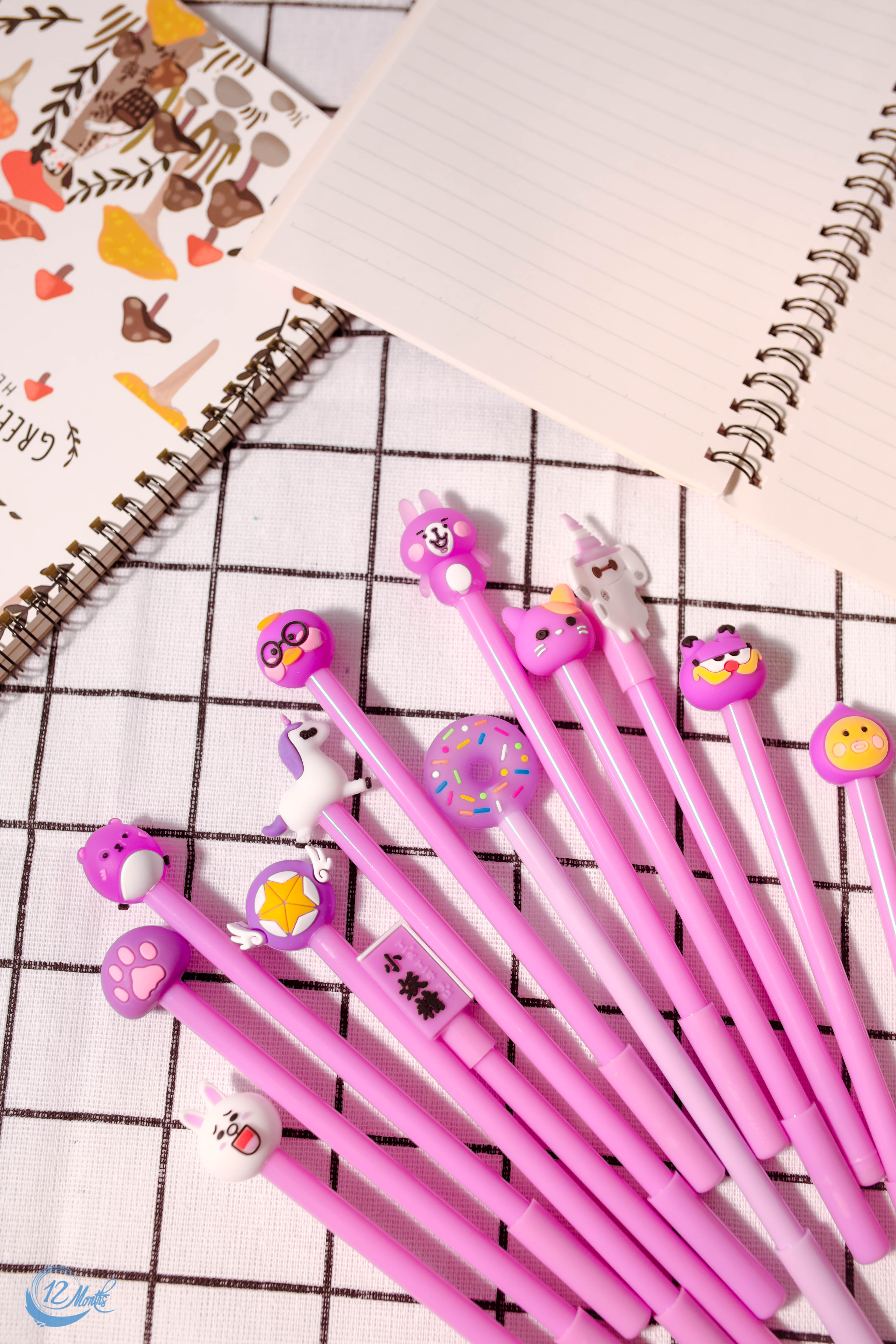 Set 20 bút bi tím hoạt hình có túi zip