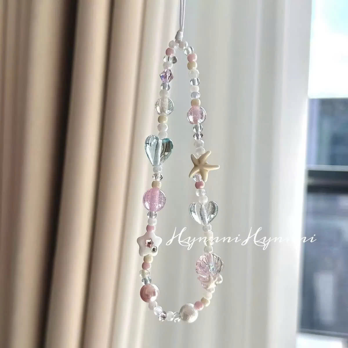 Dây đeo điện thoại chuỗi hạt