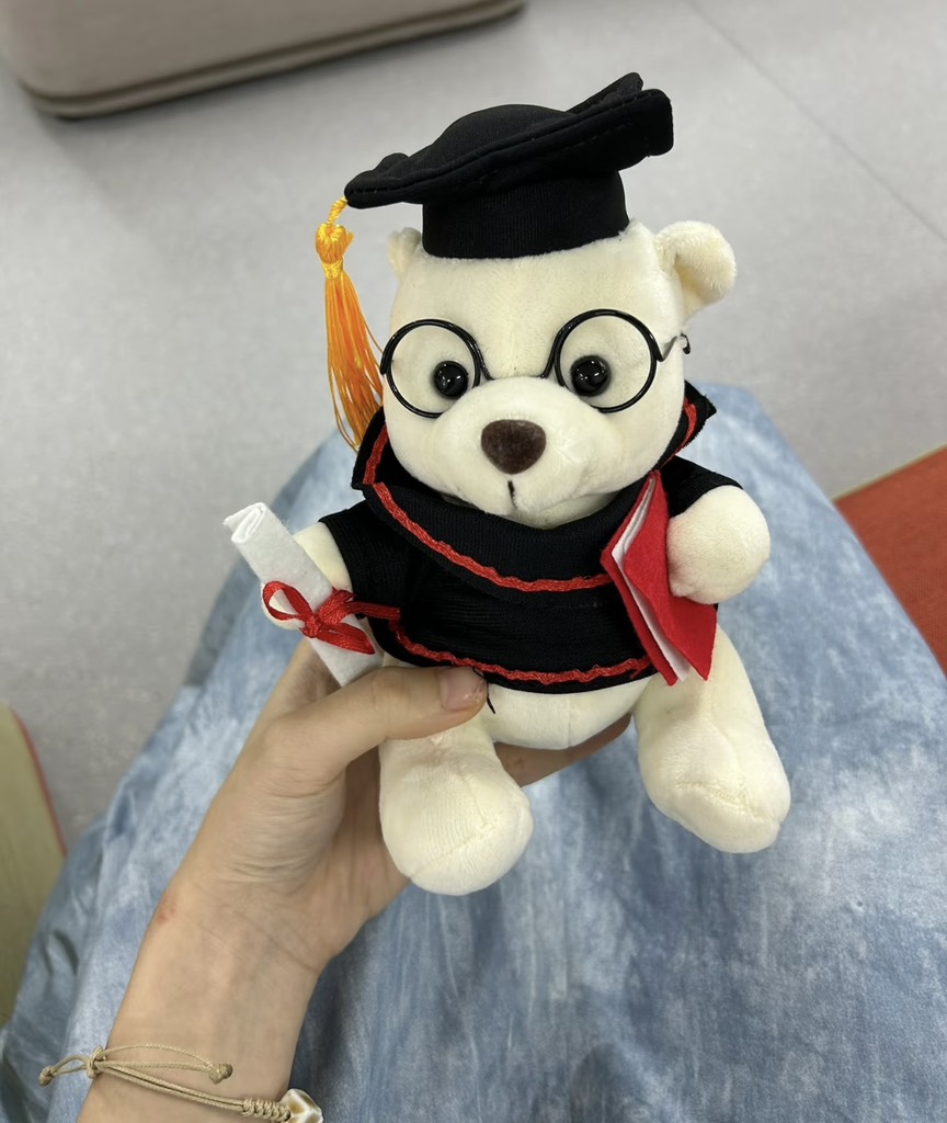 GẤU TN TRƠN ĐEO KÍNH 18CM TRẮNG KEM