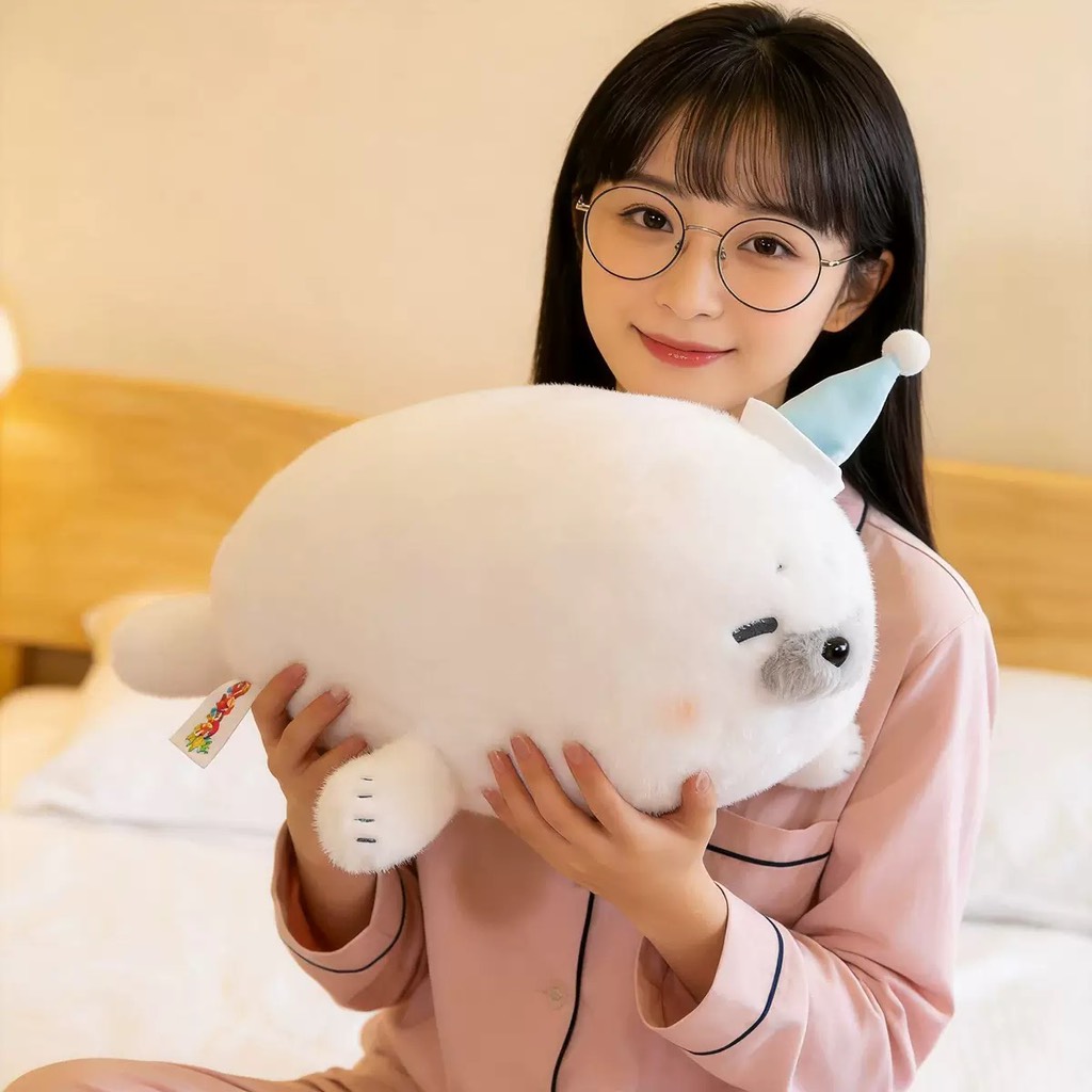 HẢI CẦU TRẮNG NẰM Ú NU ĐỘI MŨ 60CM